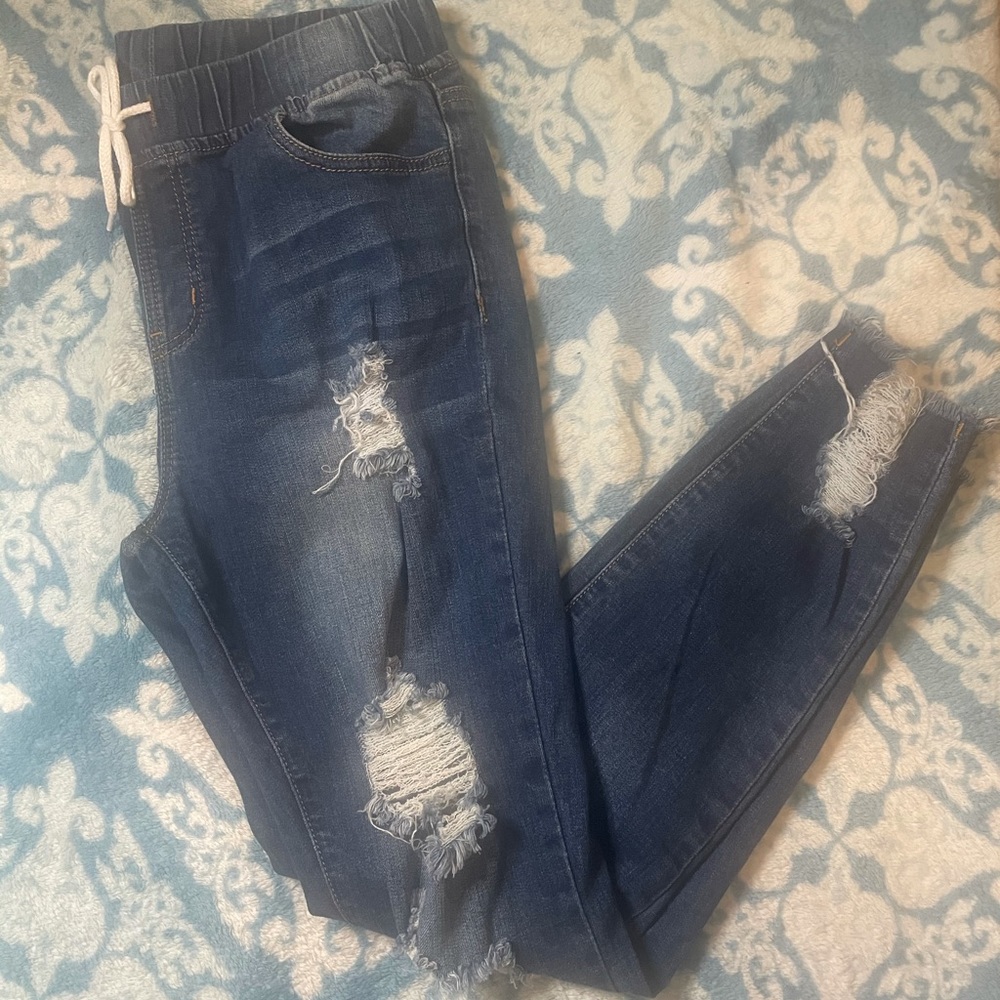 Skinny high rise distressed jean